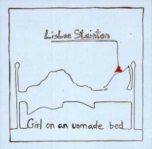 Girl on an unmade bed