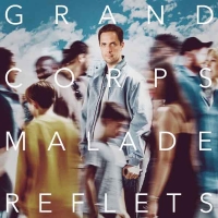 Les reflets de Grand Corps Malade…